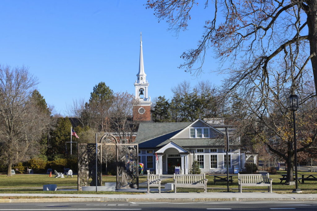 Lexington Visitors Center and church steeple at the Battle Green in Lexington, MA